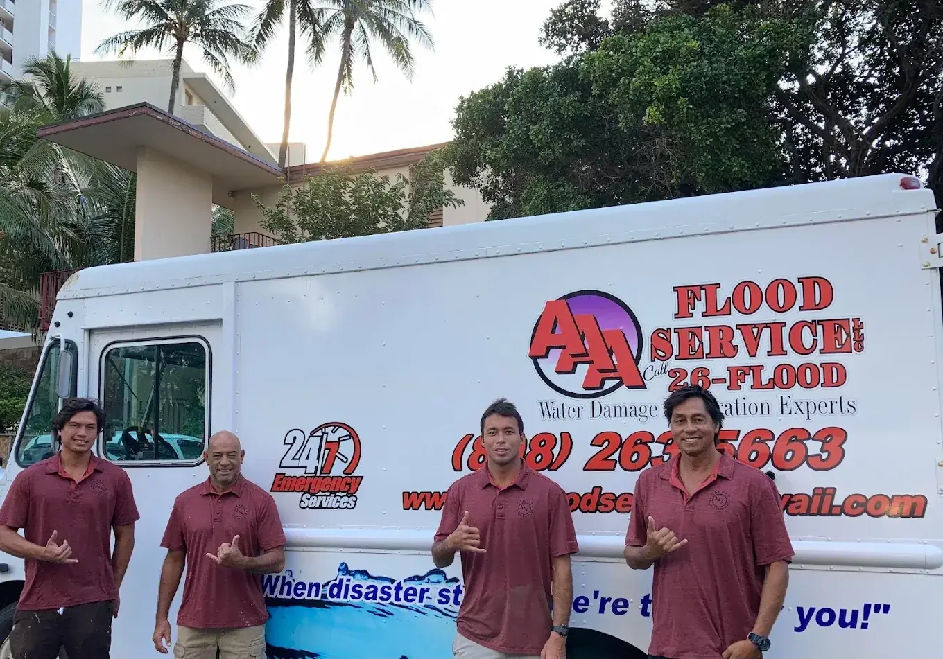 The AAA Water Damage crew in front of the AAA Flood Service box truck in Honolulu